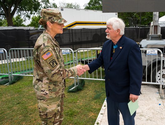 Vietnam_War_Medal_of_Honor_recipient_James_C._McCloughan_is_greeted_by_U.S._Army_Brig._Gen._Joy_L._Curriera